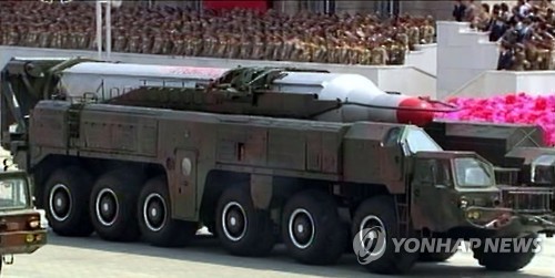 북한 “중장거리 전략 탄도로켓 시험발사 성공”