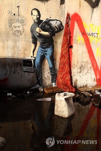 거리예술가 뱅크시, ‘68’ 50주년 맞아 파리 곳곳에 그림 남겨