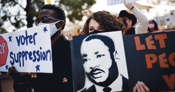 마틴 루터 킹 데이 앞두고 투표권리 확대 촉구 시위