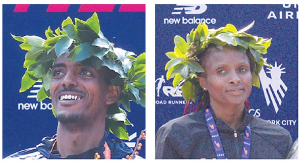 뉴욕 마라톤 대회 남녀 챔피언 타미라트 톨라(에티오피아) · 헬런 오비리(케냐)
