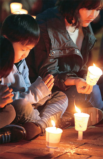 애처로운 희망의 촛불